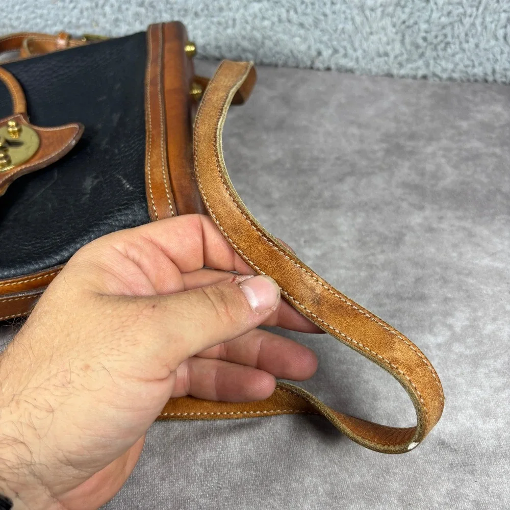 Dooney & Bourke Crossbody Bag Womens Medium Black Tan All Weather Leather Toggle